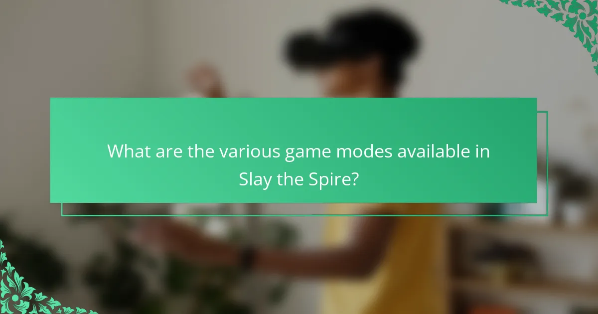 What are the various game modes available in Slay the Spire?